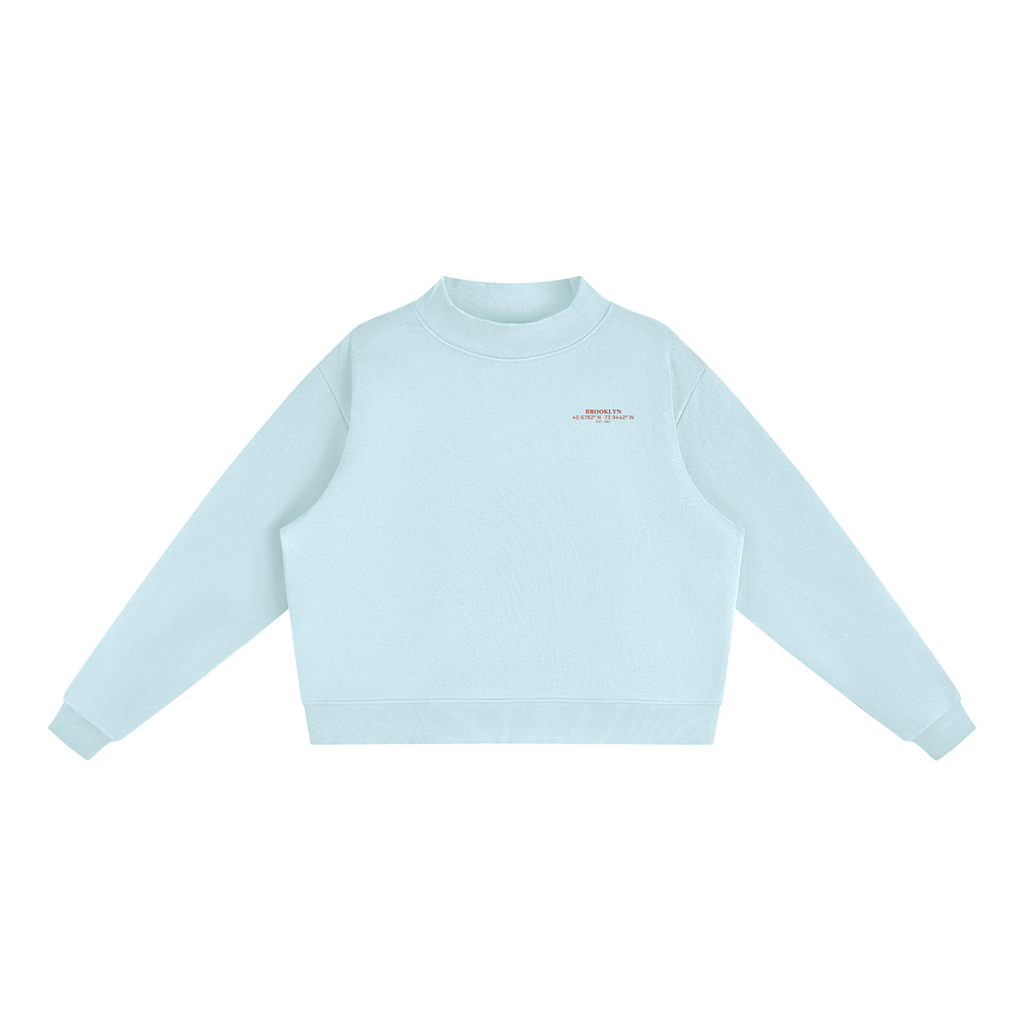 Brooklyn Mock-Neck Crew — Red Text in Light Blue, front view showing the small red BROOKLYN chest print